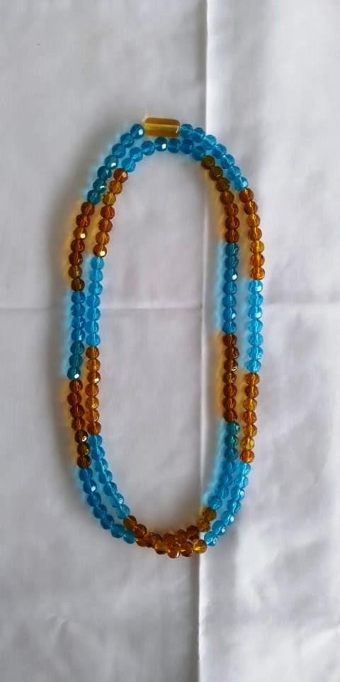 GUIA CRISTAL AMAR/AZUL 147 CONTAS - UND